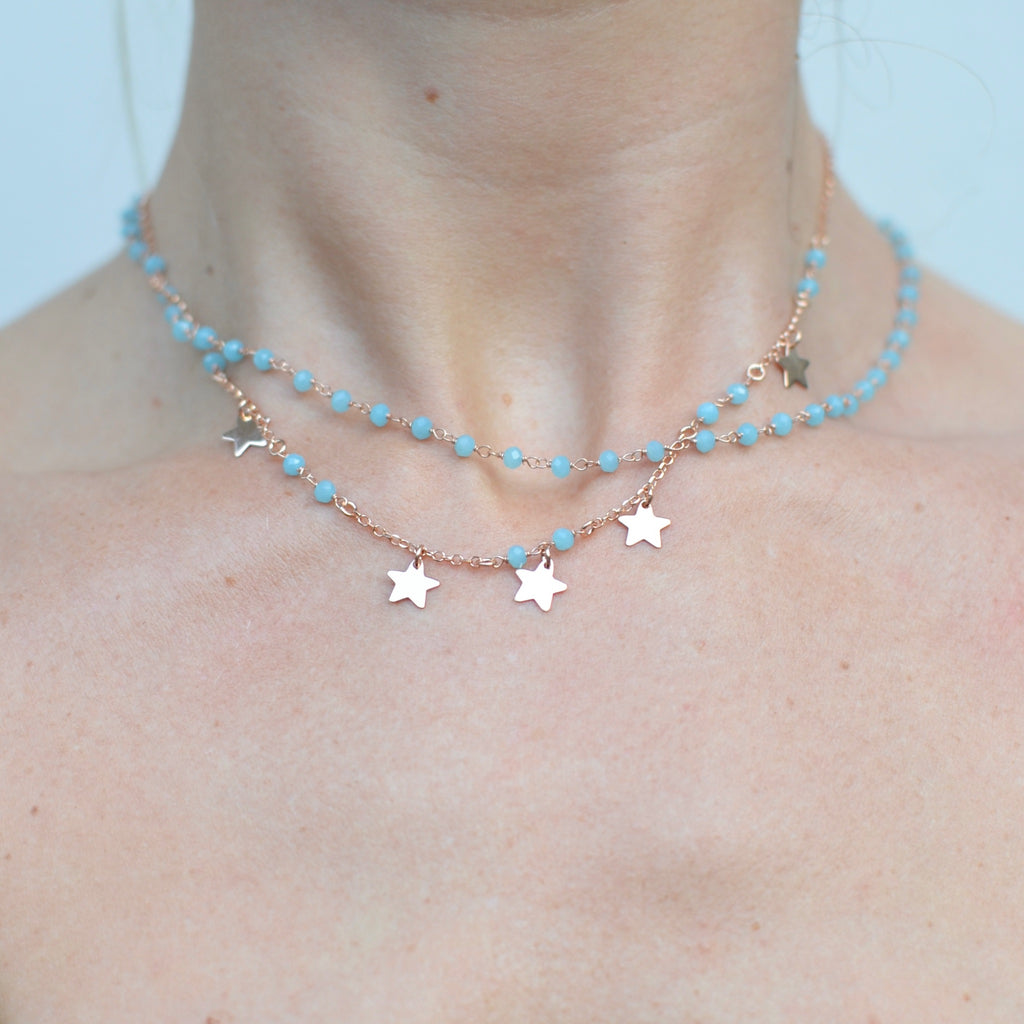 Girocollo due fili argento rose’ con pietrine azzurre e stelle pendenti