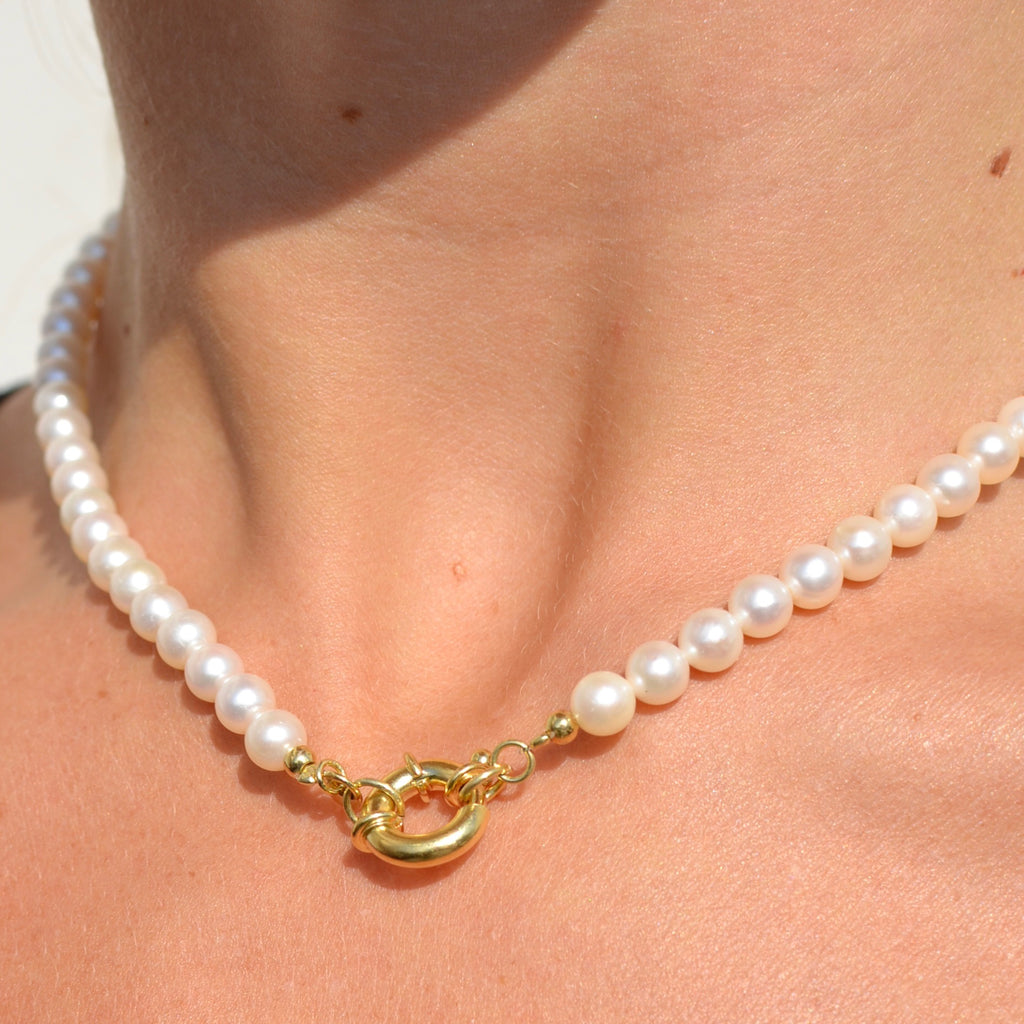 Girocollo Gemma argento gold con perle naturali  e chiusura a moschettone