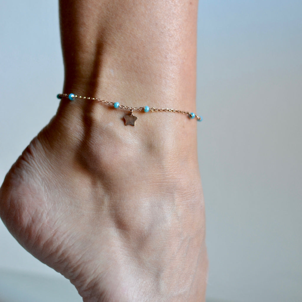 Cavigliera argento rose’ con pietre azzurre e stellina pendente